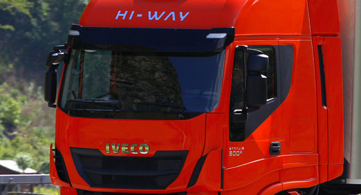 Red HGV cab in training on East Renfrewshire roads